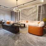 White Plush & Striped Fabric Sofa Set with Leather Panel Craftsmanship, Gold Stainless Steel Button Details & Curved Wooden Frames